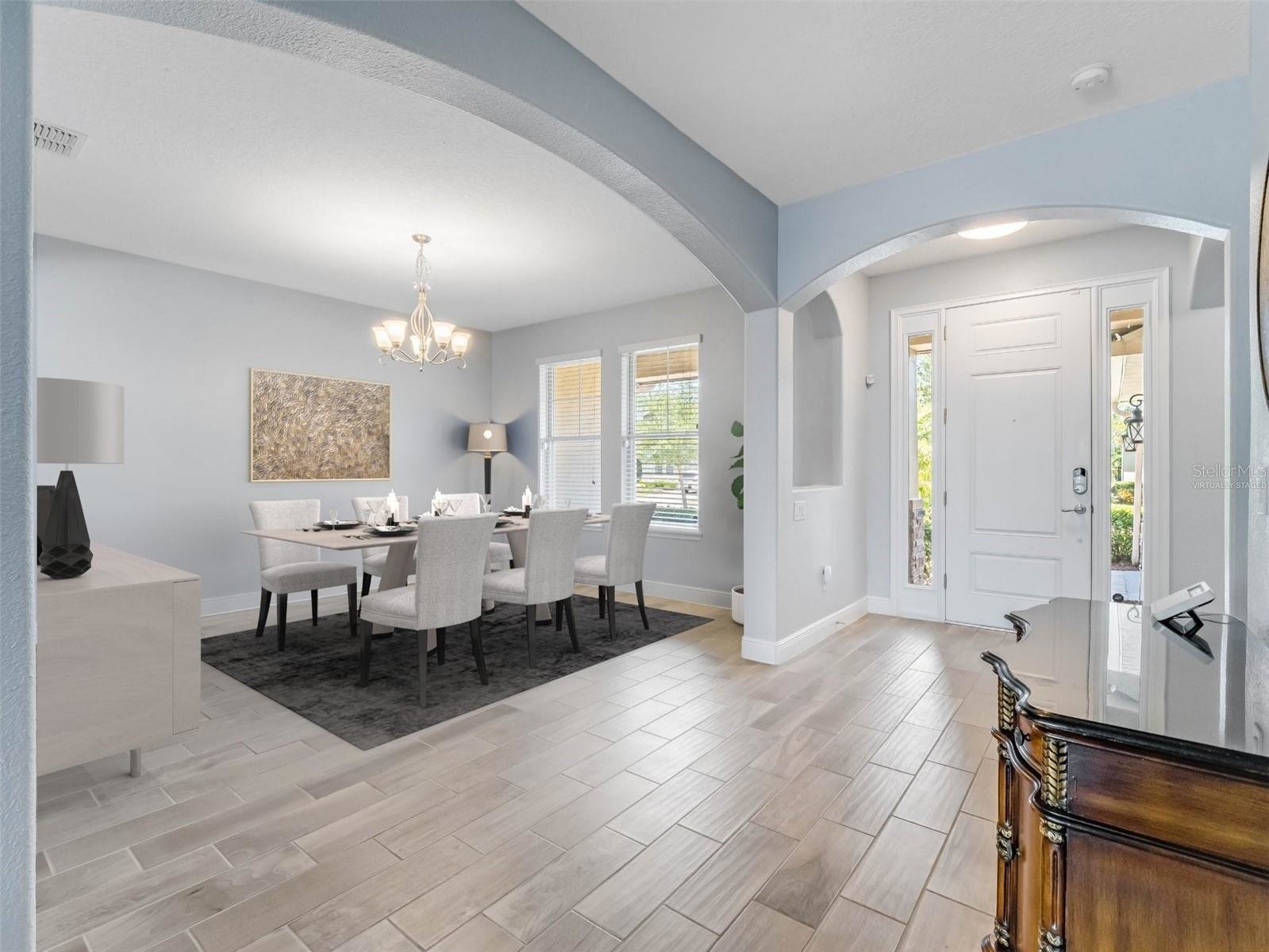 front foyer with dining room table and chairs